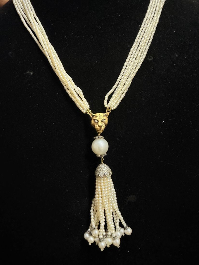Pearl tassel necklace with gold cap